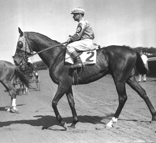 Count Fleet parades for his female fans prior to his score in the 1943 Kentucky Derby at Churchill Downs.